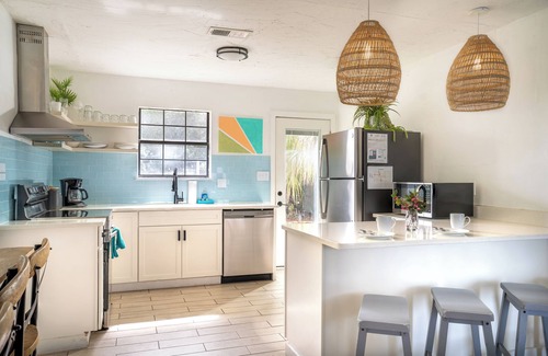 El Centro Beach House | Hot Tub, Fire Pit, King Bed! Easy Walk to Beach! Pets Allowed