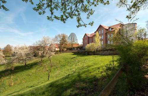 Landau Hotel | Hotel Brunnenhaus Schloss Landau