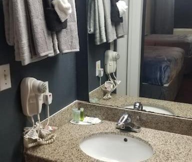 Stillwater Apartment | Hotel King Bed Hotel Room 114 Booking