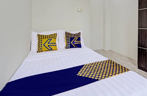 Pati Hotel | Hotel O Kristin Homestay