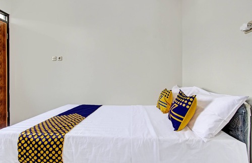 Pati Hotel | Hotel O Kristin Homestay