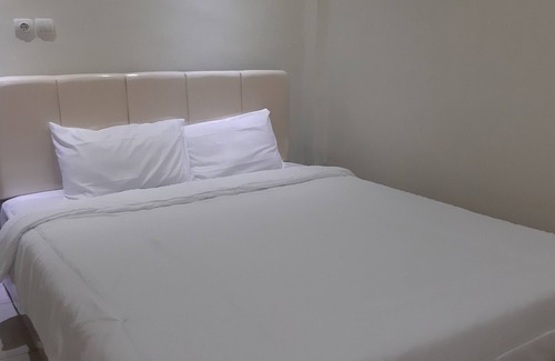 Sei Pinang Hotel | Hotel O Wisma Flamboyan NearTaman Makam Pahlawan