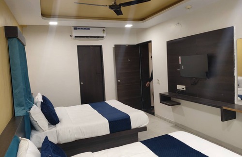 Ahmedabad Hotel | HOTEL SAROVAR GRAND