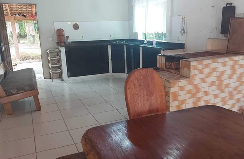 Guaratuba House | House facing the beautiful São João river, surrounded by nature.