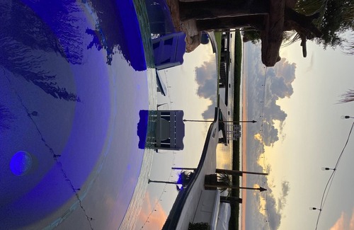 Key Largo House | House and guest house with Boat dock, sunsets, jacuzzi, pool, slide, tiki, etc