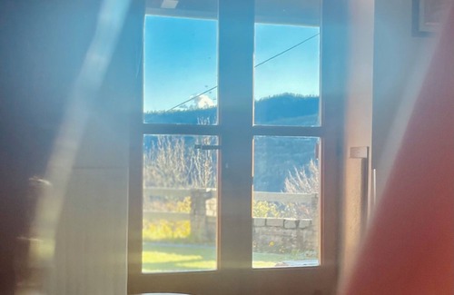 Bagnolo Piemonte House | House in the green, between peace and silence