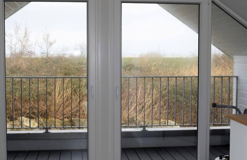 Schillig House | House No. 23, Ferienhaus Deichgraf - Modern vacation home, sauna, south-facing terrace,