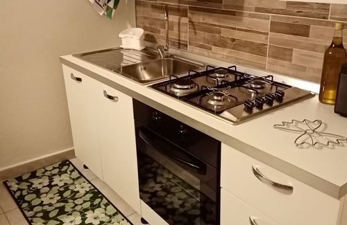 Iglesias Historic Centre Apartment | House The Ancient Olive Tree, nestled in a centuries-old olive grove with large garden around