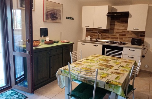 Iglesias Historic Centre Apartment | House The Ancient Olive Tree, nestled in a centuries-old olive grove with large garden around