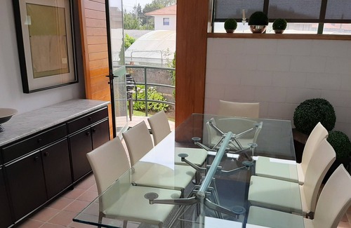 A Porqueira House | House with garden 200 meters from the beach of Panjon in the center of town, with beautiful views of the sea, recently renovated both internally and externally in June.