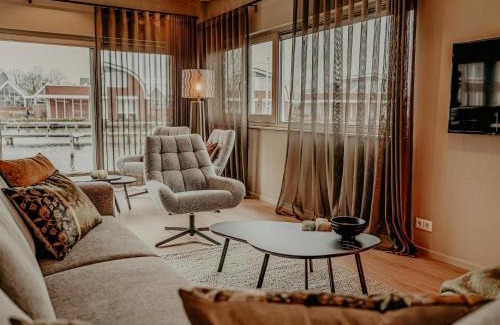 Municipality of Uitgeest House | Houseboat in Netherlands with Private Dock