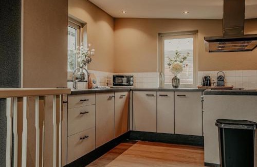 Municipality of Uitgeest House | Houseboat in Netherlands with Private Dock