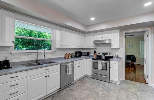 Avondale House | HUGE ranch style house with an MCM flare!