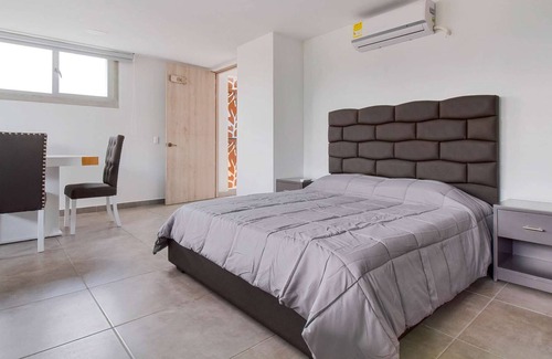 Medellin Apartment | Huge Studio in a brand new building in Parque Poblado AC, Security, Can have guests.