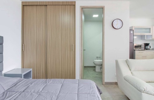 Medellin Apartment | Huge studio in a brand new building 1 block below Parque Poblado.