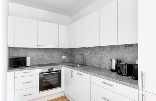 Vienna Apartment | Ideal Marinatower 2BR w/Gym & Elevator, nr metro U2, by Blueground