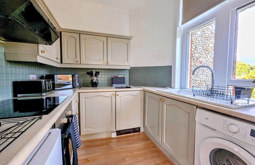 Binham Apartment | Idyllic country house holiday with a tennis court near the North Norfolk coast.
