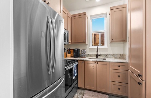 Fredericksburg House | In Town Villas | On Austin St. |Private Fireplaces and Hot Tubs