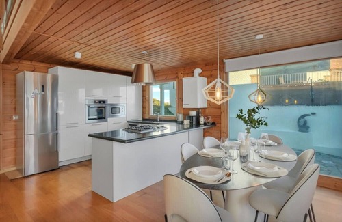 Cabrita Ski Chalet | Incredible wooden villa with sea views!