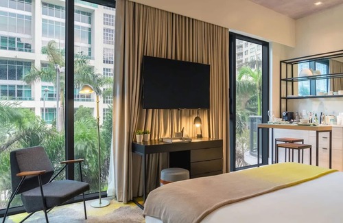 Midtown Hotel | Indulge in Luxe Midtown Stay near Pérez | Kitchenette, Deck Pool in Midtown