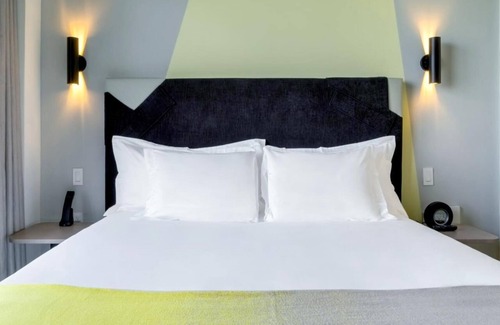 Midtown Hotel | Indulge in Luxe Midtown Stay near Pérez | Kitchenette, Deck Pool in Midtown