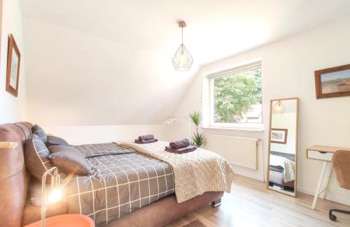 Rosengarten Apartment | INIKAMA - Bohemian Apartment im Grünen