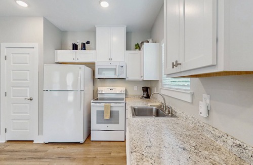 Fulton House | Inviting coastal home with shared pool and stocked pond - steps to the beach