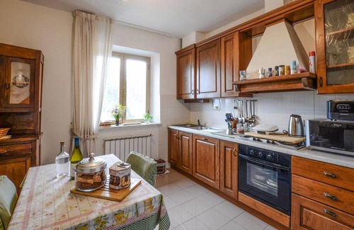 Gassano Apartment | Inviting vacation apartment with panoramic views of the countryside.