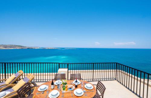 Bugibba Apartment | Islet Promenade Seafront Penthouse with breathtaking seaviews and private hot tub on the large terrace by Getawaysmalta