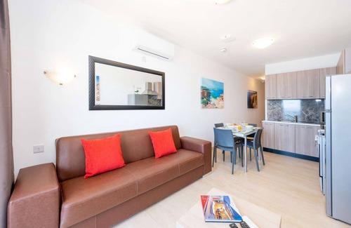 Qawra Apartment | Islet Promenade Seafront 1 Bedroom Apartment with 2 seaview balconies