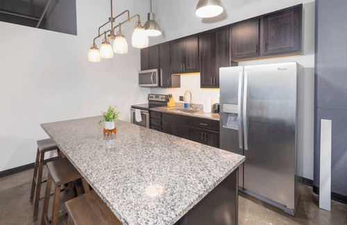 Strip District Apartment | King Bed - Heart of PB - Jaw-Dropping Rooftop+Gym