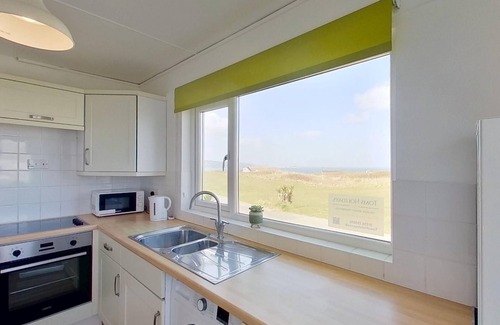 Hayle Cottage | Kingfisher enjoys an elevated position towards the front of the Riviere Towans