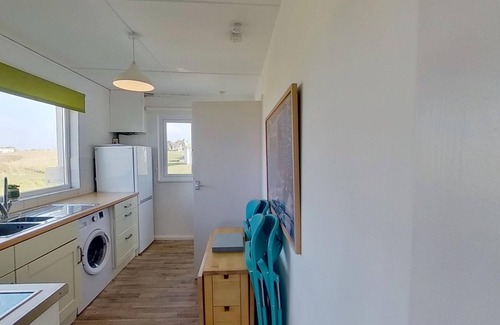 Hayle Cottage | Kingfisher enjoys an elevated position towards the front of the Riviere Towans