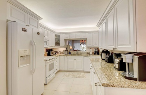 Kings Lake Condo | Kings Lake First Floor Corner Condo with 2 Lanais and Walk to the Community Pool