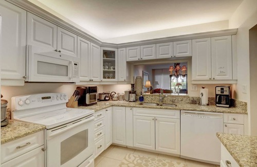 Kings Lake Condo | Kings Lake First Floor Corner Condo with 2 Lanais and Walk to the Community Pool