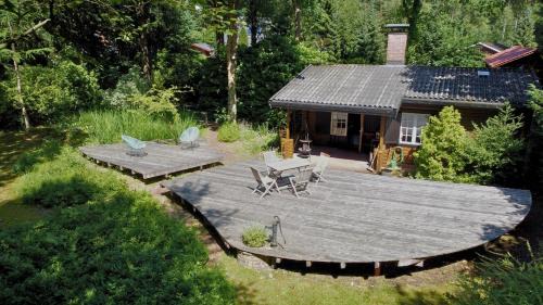 Bielenberg House | kuscheliges Waldhaus Kaminknistern