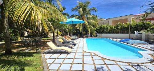 Tamarin Apartment | LAKAZ DEL SOL - Modern and elegant apartments with luxurious garden, pool and barbecue area - Tourism Permit Certified