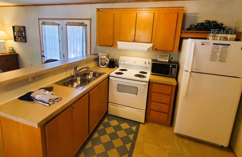 Blue Eye Cottage | Lake "Beach" Cottage w/Boat Slip & Rentals, Dock & Hot Tub!