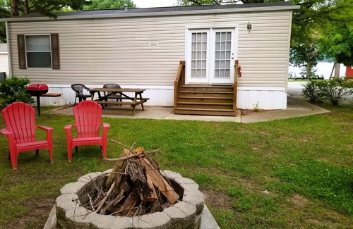 Blue Eye Cottage | Lake "Beach" Cottage w/Boat Slip & Rentals, Dock & Hot Tub!