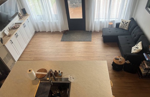 National City Cottage | Lake/beach front property with kayaks, pedal boat, & row boat, near Tawas Bay