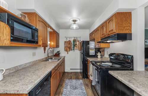 Eagle River Condo | Lake Forest Resort – Relax on a Pristine Sandy Beach in the Northwoods!