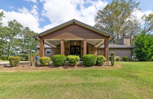 Stewart House | Lake front with dock and boat ramp