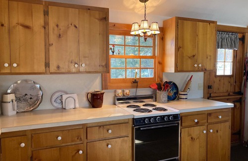 Freedom Cabin | Lake Ossipee New Hampshire waterfront cabin with beach, dock, fire pit, privacy.