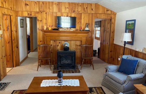 Freedom Cabin | Lake Ossipee New Hampshire waterfront cabin with beach, dock, fire pit, privacy.