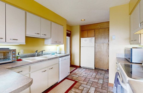 Gilford House | Lake-view townhome with lakefront swimming, pools, tennis/pickleball