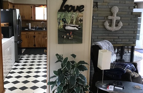 Waverly House | Lake Whitetail Cottage 3/2 with a carport & large back porch.