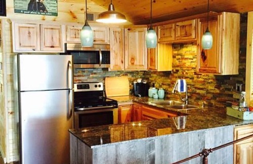 Caroga Lake Cabin | Lakefront accommodations with outdoor Jacuzzi