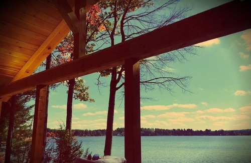 Caroga Lake Cabin | Lakefront accommodations with outdoor Jacuzzi