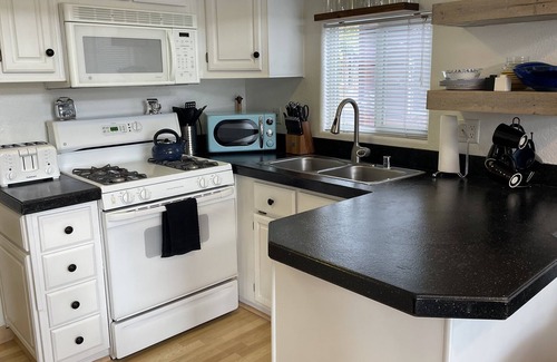 Peninsula Village Cabin | Lakefront Cabin, Boat slip, King bed, Seasonal Beach & Great View!