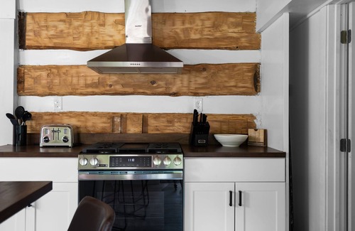 Central Lake Cabin | [Lakefront Cabin] w/sandy private beach, docks, kayaks, sunsets